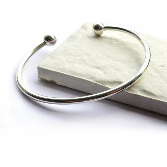 Torque Silver Bangle